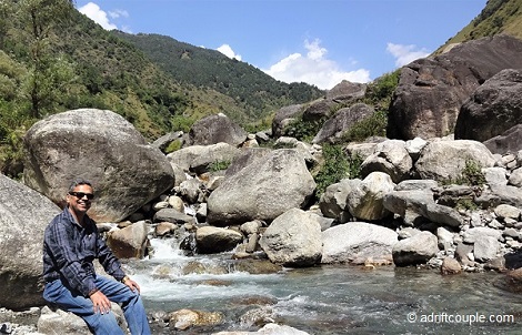 Enveloped by extreme peace sitting on a rock by the Gunehar river.